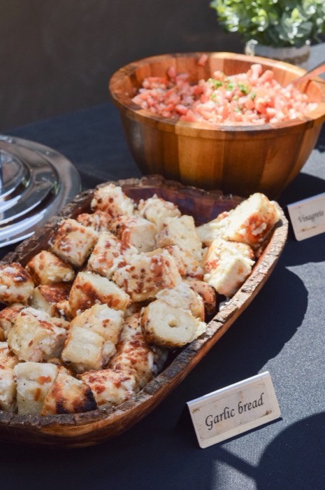 Grilled coalho cheese pieces on a serving tray